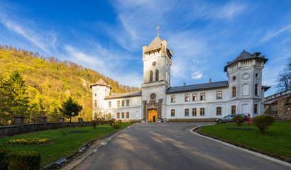 Fototapeta na wymiar Tismana Monastery, Romania. Tismana Monastery is one of the oldest monastic settlements in Wallachia, Romania from 14th century. It was built by Saint Nicodim