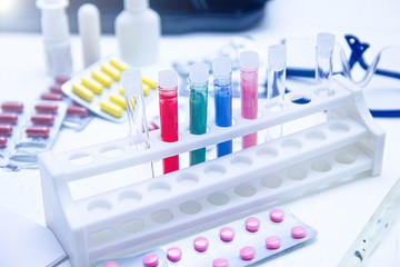 testing pills and test tubes. The concept of research on vaccination, pharmacology and biotechnology of drugs. science and medicine.