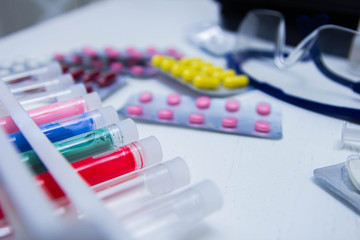 pills and test tubes. The concept of research on vaccination, pharmacology and biotechnology of drugs. science and medicine.