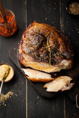 Baked pork leg with spices and mustard
