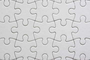 Close up on blank, white jigsaw puzzle texture