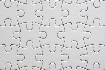 Fototapeta premium Close up on blank, white jigsaw puzzle texture