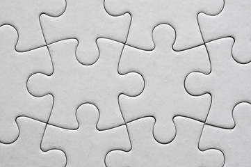 Close up on blank, white jigsaw puzzle texture