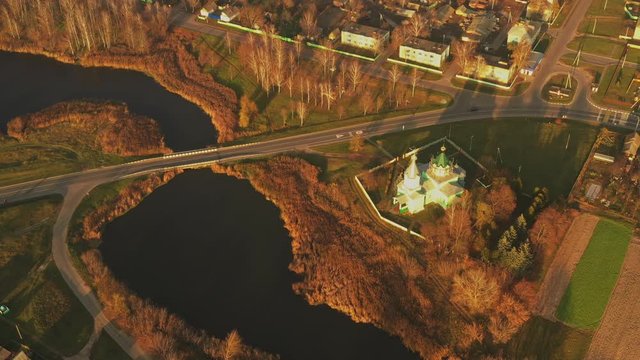 Krupets, Dobrush District, Gomel Region, Belarus. Aerial View Of Old Wooden Orthodox Church Of The Holy Trinity At Sunny Autumn Day