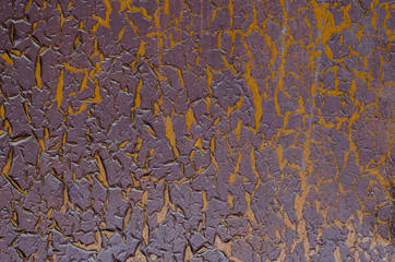 Peeling paint on an old door. Old peeled wall.