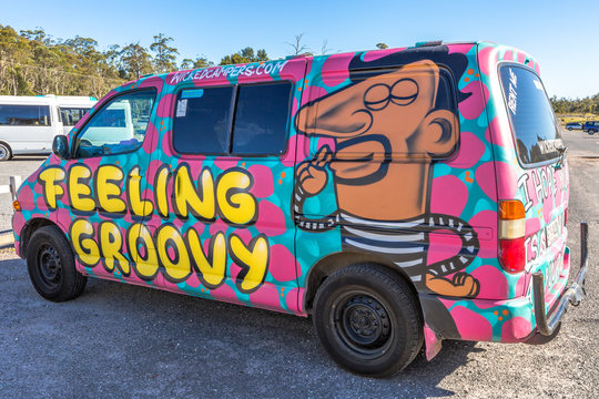 Sydney, Australia - January 11, 2015: Hippie van with Feeling Groovy airbrushing hand made. Typical campers from Australian company: Wickedcampers.