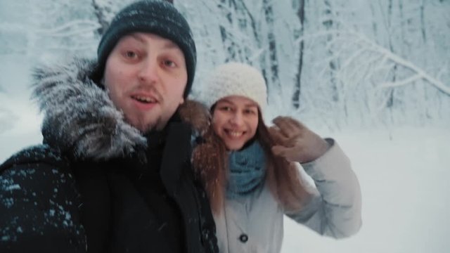POV shot of millenial overjoyed couple vloggers recording video for travel blog