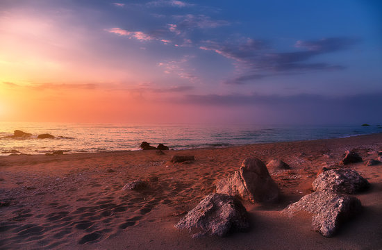 Colorful colorful seascape during sunset. Incredible nature Landscape. Amazing beach sunset with Picturesque sky. Unsurpassed sunrise over the Ionian Sea. Wonderful view of Avali Beach. Greece