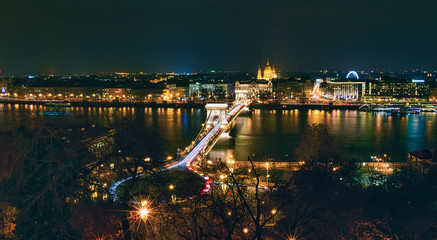 Fototapeta na wymiar Széchenyi Chain Bridge illuminated at night in Budapest, Hungary