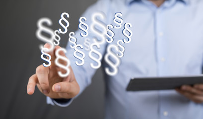 paragraph law sign digital in hand