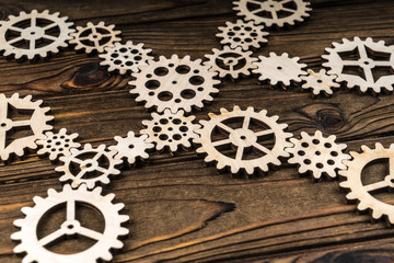 Wooden gears assembled in a puzzle.. Business concept idea of cooperation, partnership, teamwork, innovation.