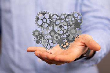 Business, Internet and technology concept. Business select gear icon on virtual screen.