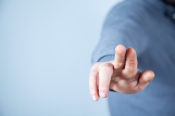 Naklejka premium man touching in screen