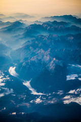 Tall view of misty Alps valleys, Austria