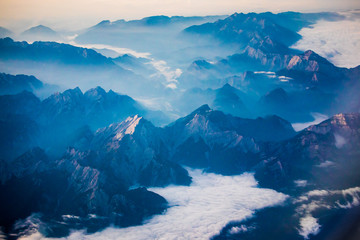 Fototapeta na wymiar Misty Alpen valleys, Austria, aerial view