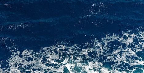 Background shot of aqua sea water surface. Abstract texture of nature.  used as background