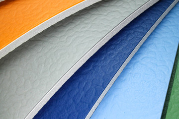 Multi-colored patterns on a white background.