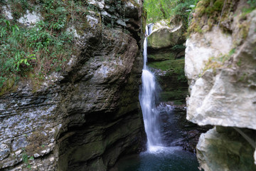 Obraz premium natural waterfall in a cave in Slovenia