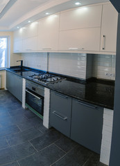 Fototapeta premium Cabinet furniture for the kitchen, a modern interior for small rooms