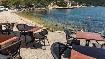 Beautiful Ioniat sea Seascape. Wonderful summer day best place for holiday. Amazing Greece. Fiskardo village and harbor. Kefalonia island, Greece, Europe. Turquoise colored bay in Mediterranean sea.