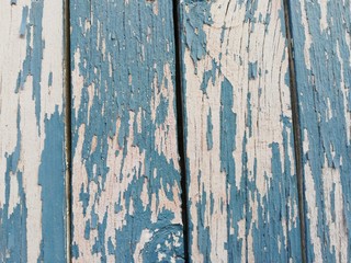 Fototapeta na wymiar Blue Peeling Paint on Wood