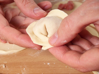 Bring opposite ends together and join them. Preparation Meat Dumplings.