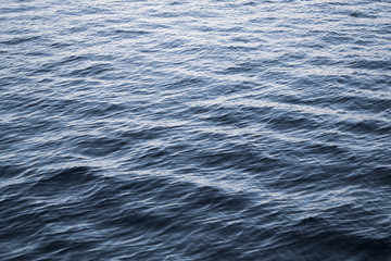 The river, the flow of water. Sea abstract texture.