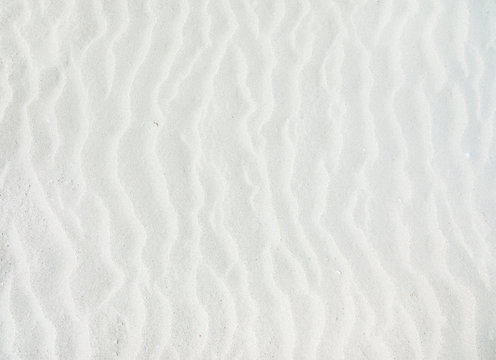 Waves Of White Sand Background