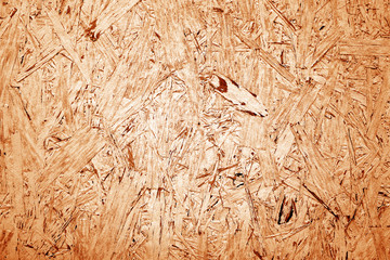 Fiber chipboard pattern in orange tone.