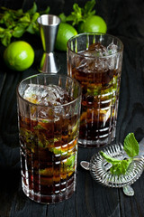  Cuba libre cocktail, iced drink with lime,  cola, rum  and mint