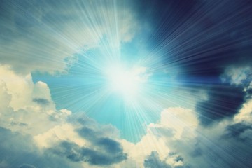 The clouds. Sun rays. Evening sky. Atmosphere. Sunset. Dawn. Beautiful sky. Constellations.