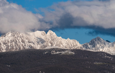View of Indian Peaks from Fraser Valley Colorado.  The west side of the Indian Peaks at sundown viewed from the Fraser Valley.  The towns of Tabernash and Fraser are below the Indian Peaks.