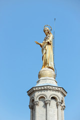 Golden statue of Virgin Mary at Palais des papes in Avignon