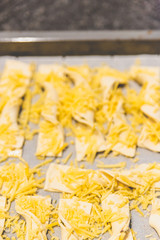 Making cheese stems that just come out of the oven.