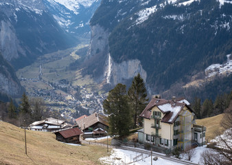 View of the Lauterbrunnen Valley from high up above the village of Wengen in the Swiss Alps,...