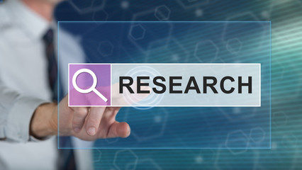 Man touching a research concept