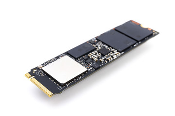 SSD hard drive NVMe version for M.2 slot laid on white background with narrow focus