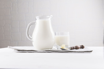 Homemade fermented beverage kefir with kefir grains in bowl on a white background, concept of natural fermented food and intestinal health