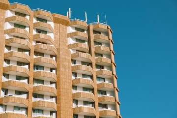 Concrete modernist building sunny day blue sky 