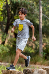 Cute boy outdoor running