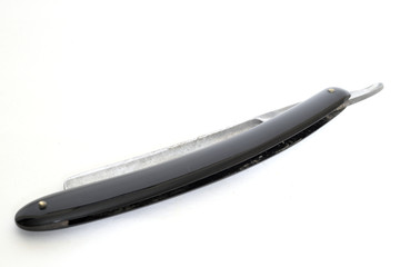 dangerous razor on a white background