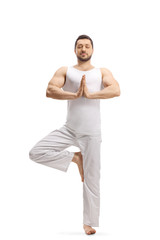 Young man practicing yoga