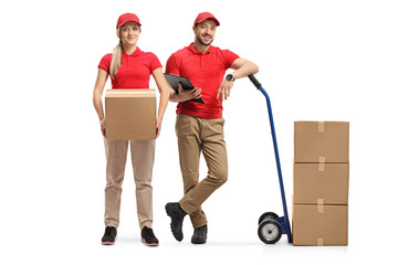 Delivery man and woman with boxes and a hand truck
