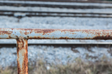 Rusted piece of fence for the trains