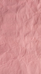 wrinkled pink paper  vertical orientation