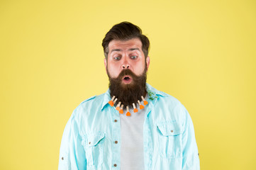 Obraz premium Male barber care. Laundry after washing. hair drying at barbershop. hairdresser concept. man clothespin on beard. brutal male put clothespin with hearts on beard. bearded man hipster casual style