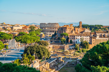 Fototapeta na wymiar View at Coliseum and Roman Forum from above. Travel to Italy concept.