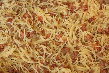 vermicelli, navy pasta, with minced meat close up