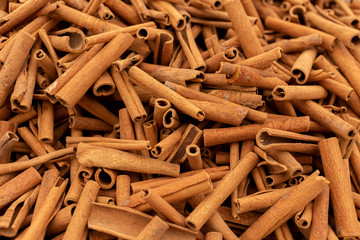 Cinnamon sticks background.  Aphrodisiac food for desire.