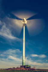 wind turbine against blue sky